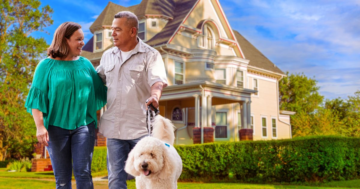 Couple walking dog in Redlands