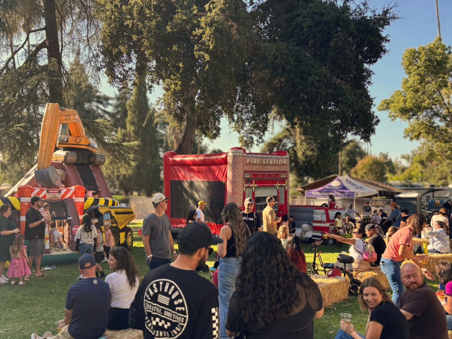 kids and families enjoying bounce houses