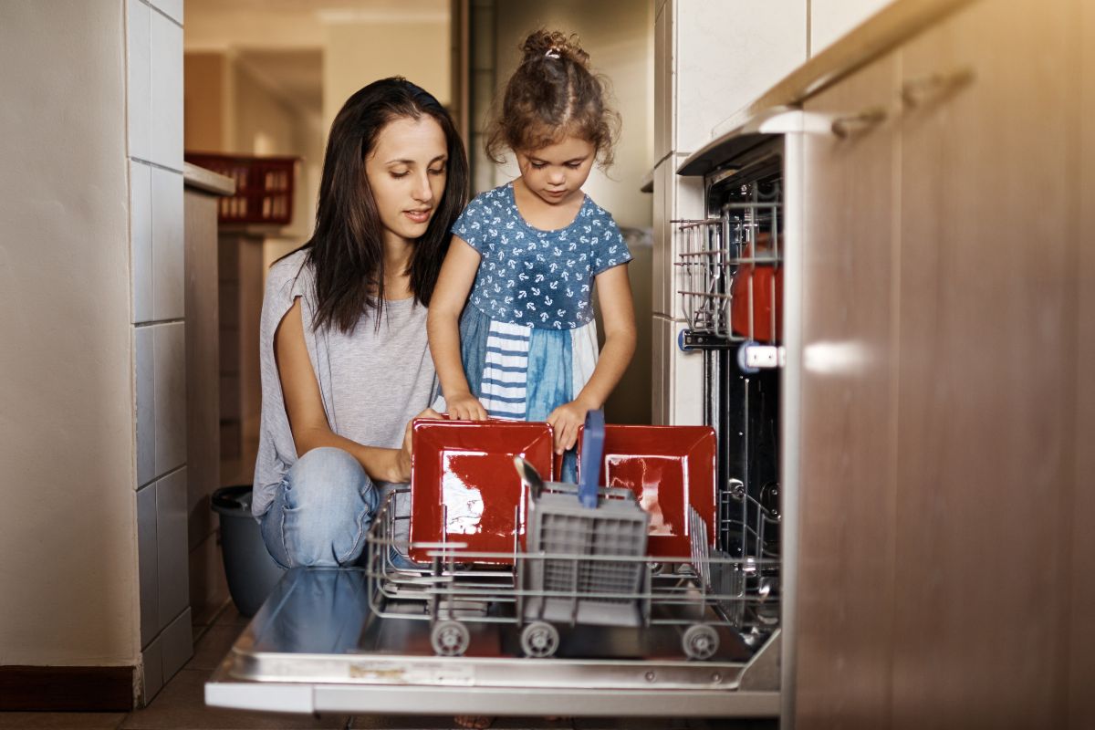 mom and daughter doing dishes
