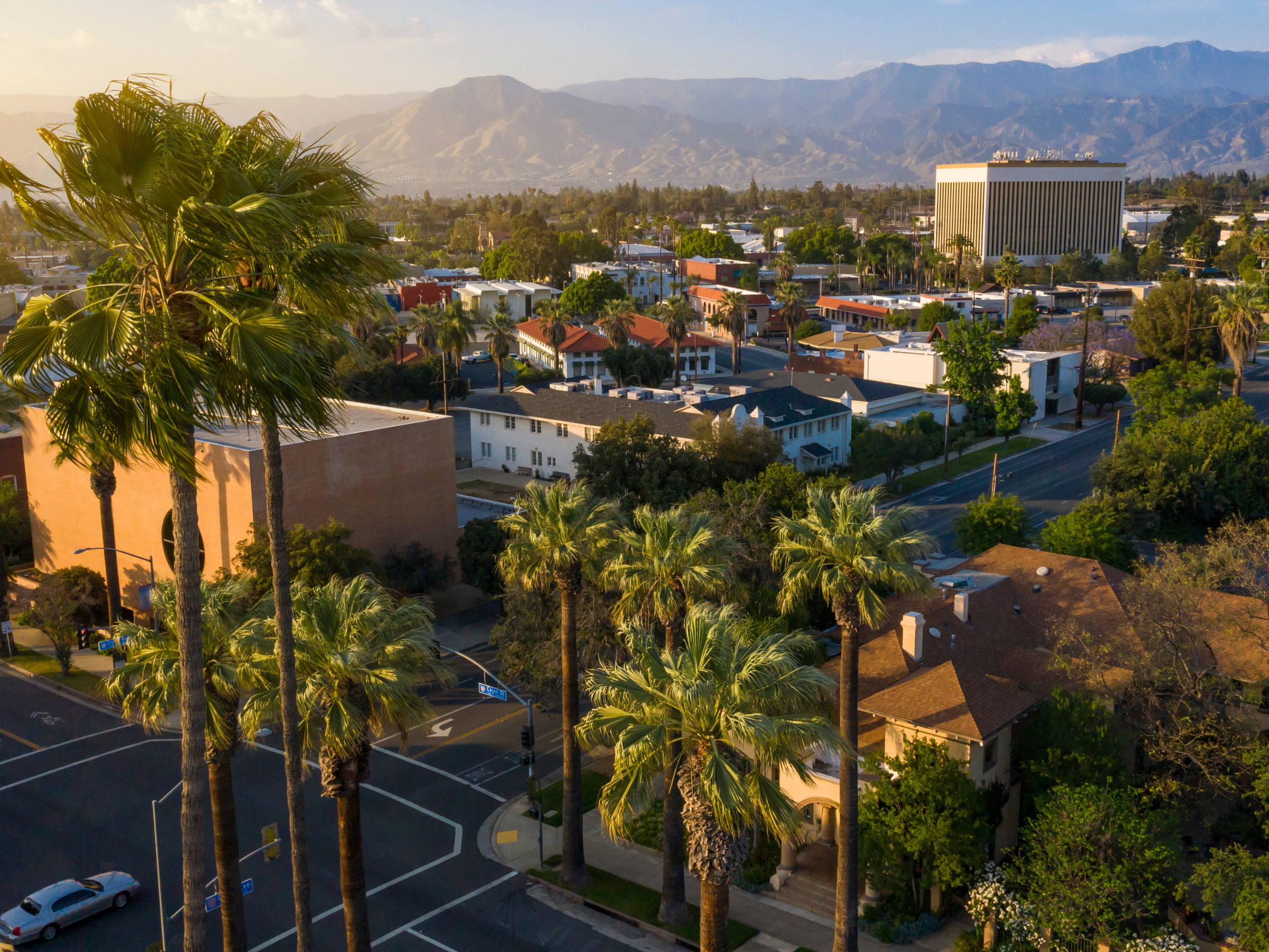 arial view of downtown Redlands at sunset with palm trees