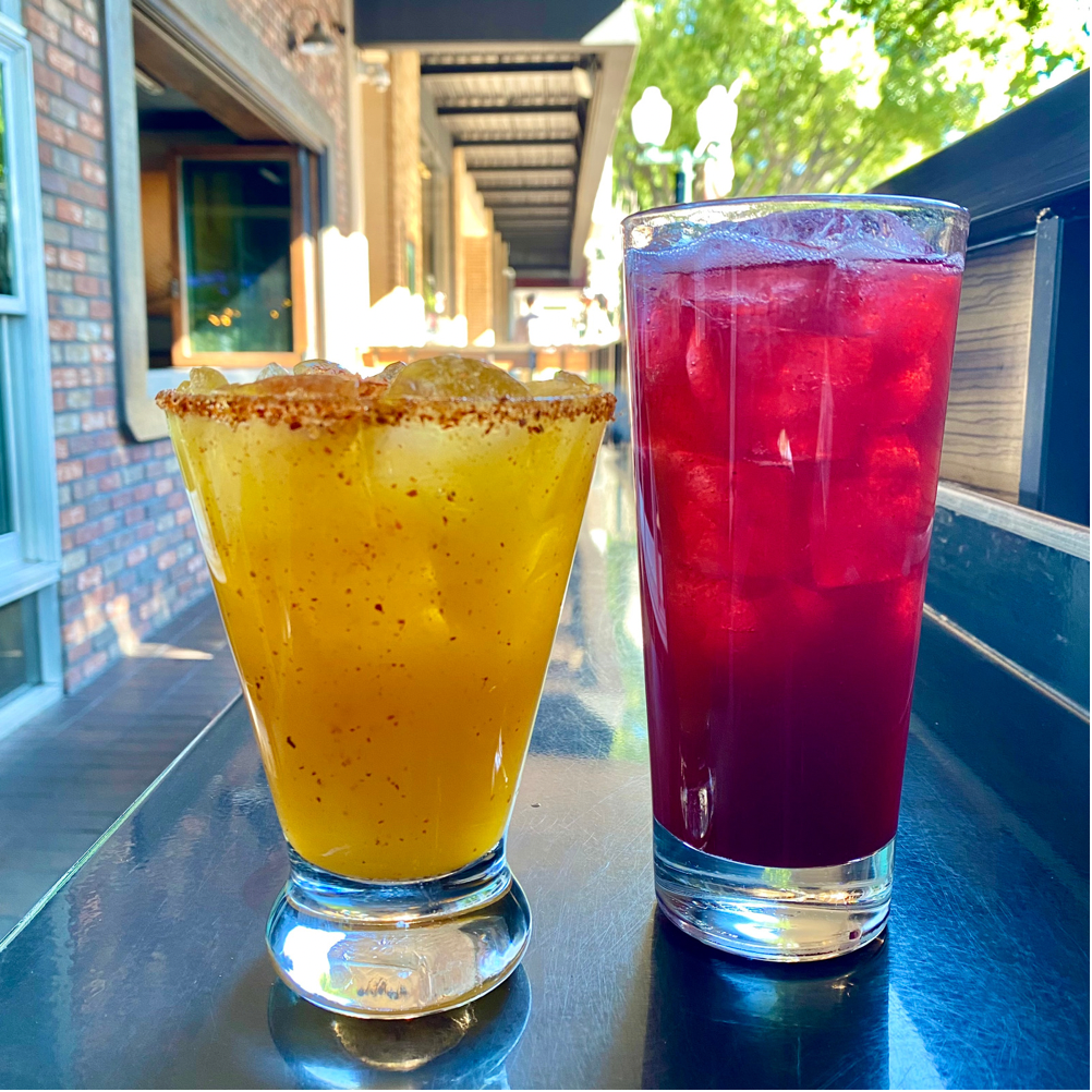 Mambacita Mango Margarita (left), Blackberry Bourbon Smash (right) at Darby’s American Cantina
