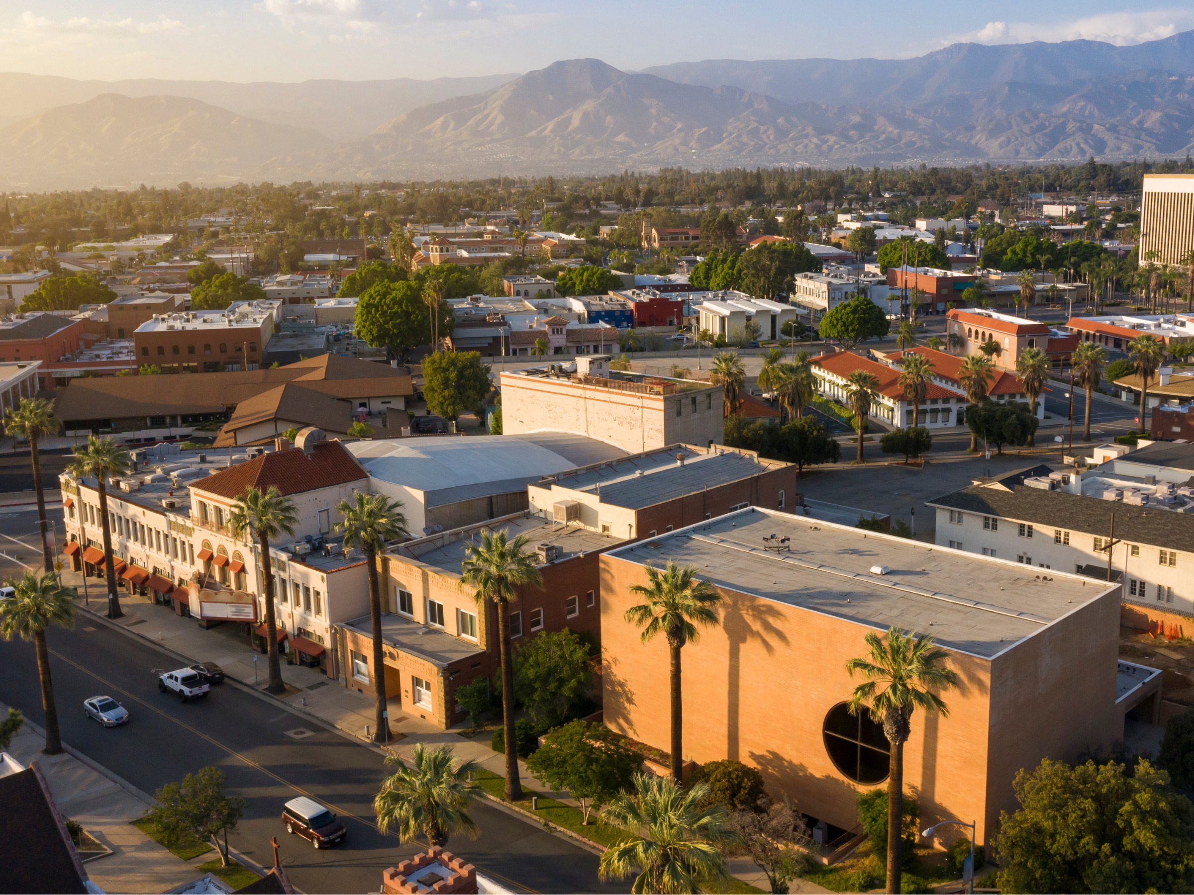 arial view of downtown Redlands at sunset with palm trees